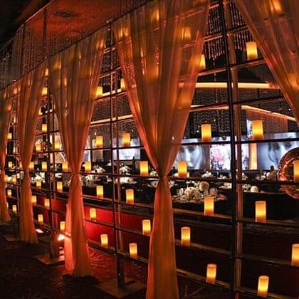 Candle Wall 5′ x 10′ – w/White Voile Drape – Gold | Rental Candle Wall 5′ x 10′ – w/White Voile Drape – Gold | Rental