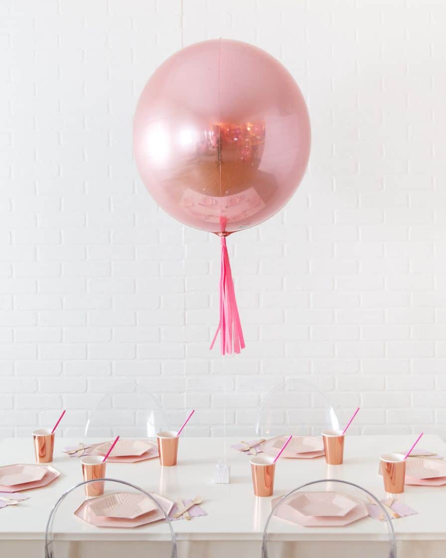 Life In Plastic 21in Rose Gold Orb Foil Balloon with Fuchsia Skirt Centerpiece | Purchase