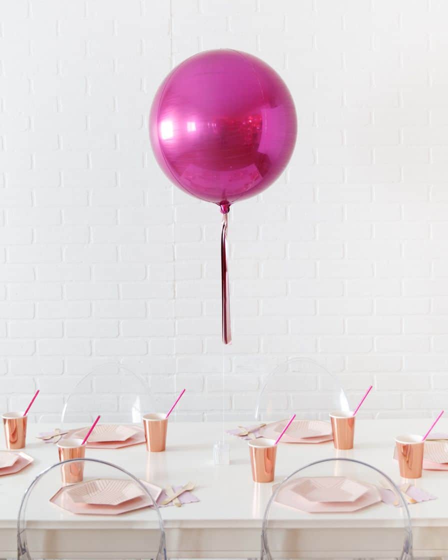 Life In Plastic – 16in Foil Balloon Centerpiece with Skirt | Purchase